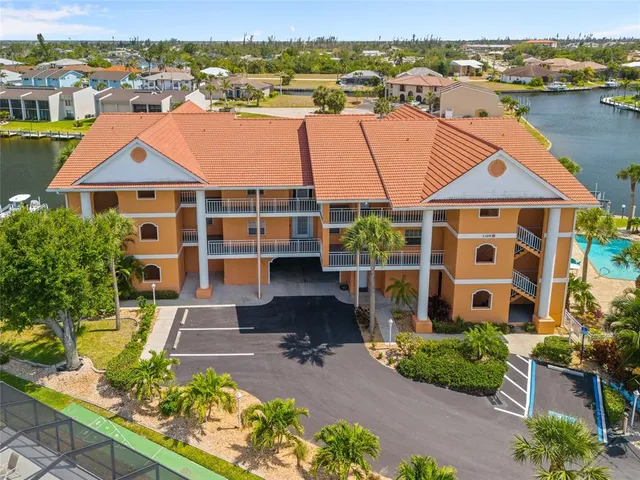 an aerial view of a house with a ocean view