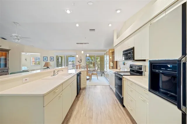 a bedroom with a bed couch and window