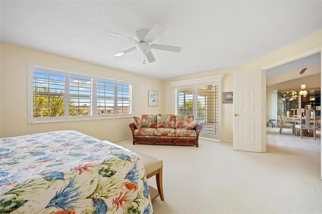 a bedroom with a bed and a couch