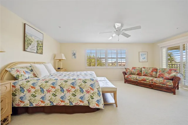 a bathroom with a granite countertop sink a toilet and a mirror