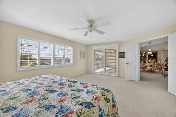 a bathroom with a sink mirror and vanity