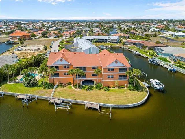 a view of a swimming pool with a lawn chairs