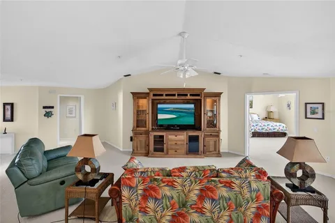 a kitchen with a sink appliances and cabinets