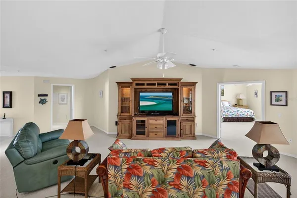 a kitchen with a sink appliances and cabinets