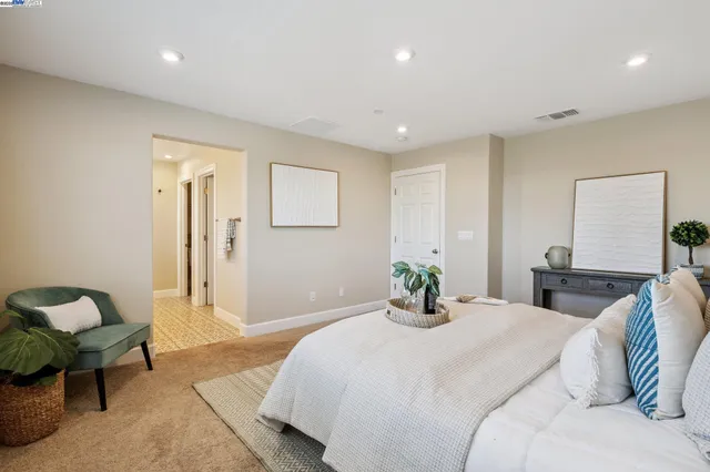 a bathroom with a double vanity sink mirror and shower