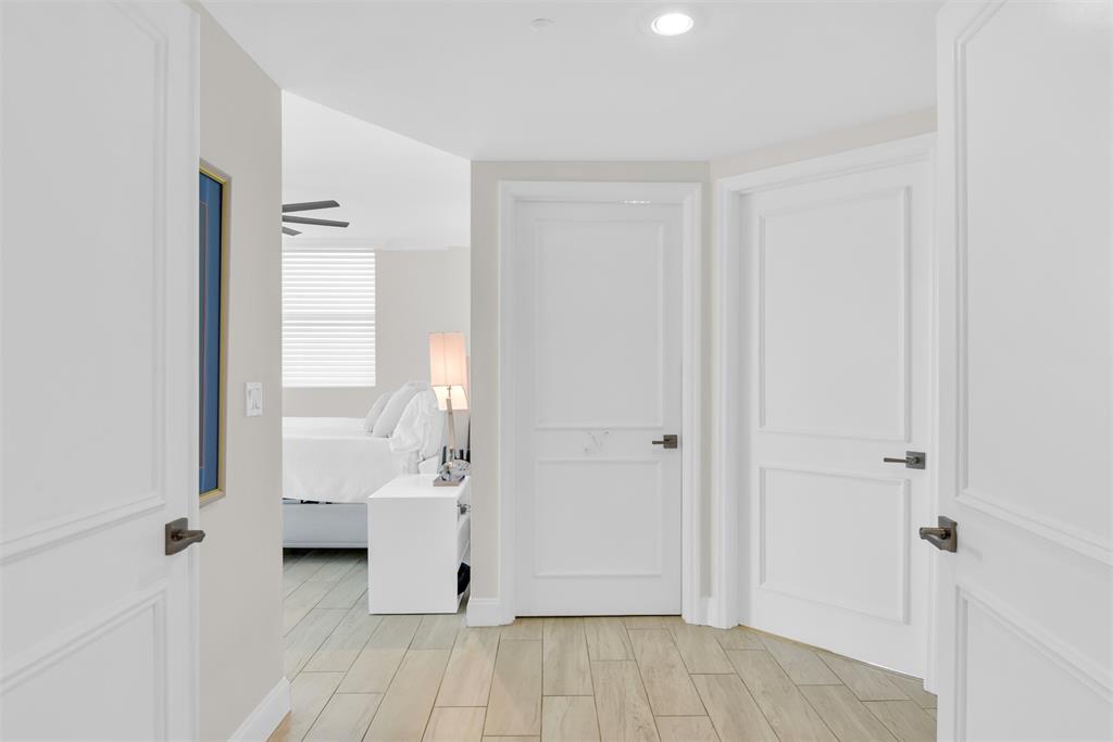 3700 South Ocean Boulevard, Unit 206 Highland Beach, FL 33487 - Photo 12 of 31 a view of a room with white walls and windows