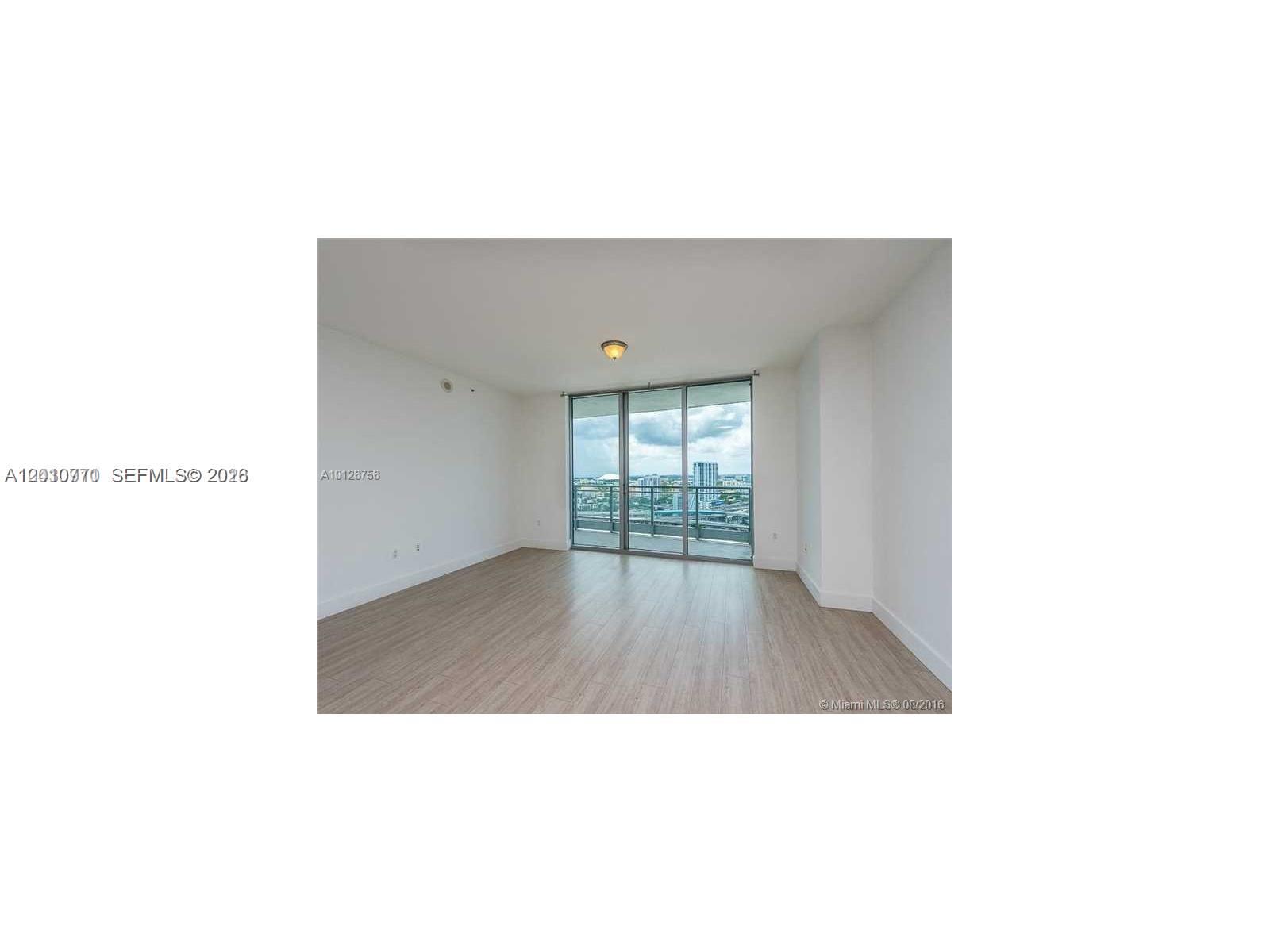 90 Southwest 3rd Street, Unit 2609 Miami, FL 33130 - Photo 4 of 12 a open hall with toilet