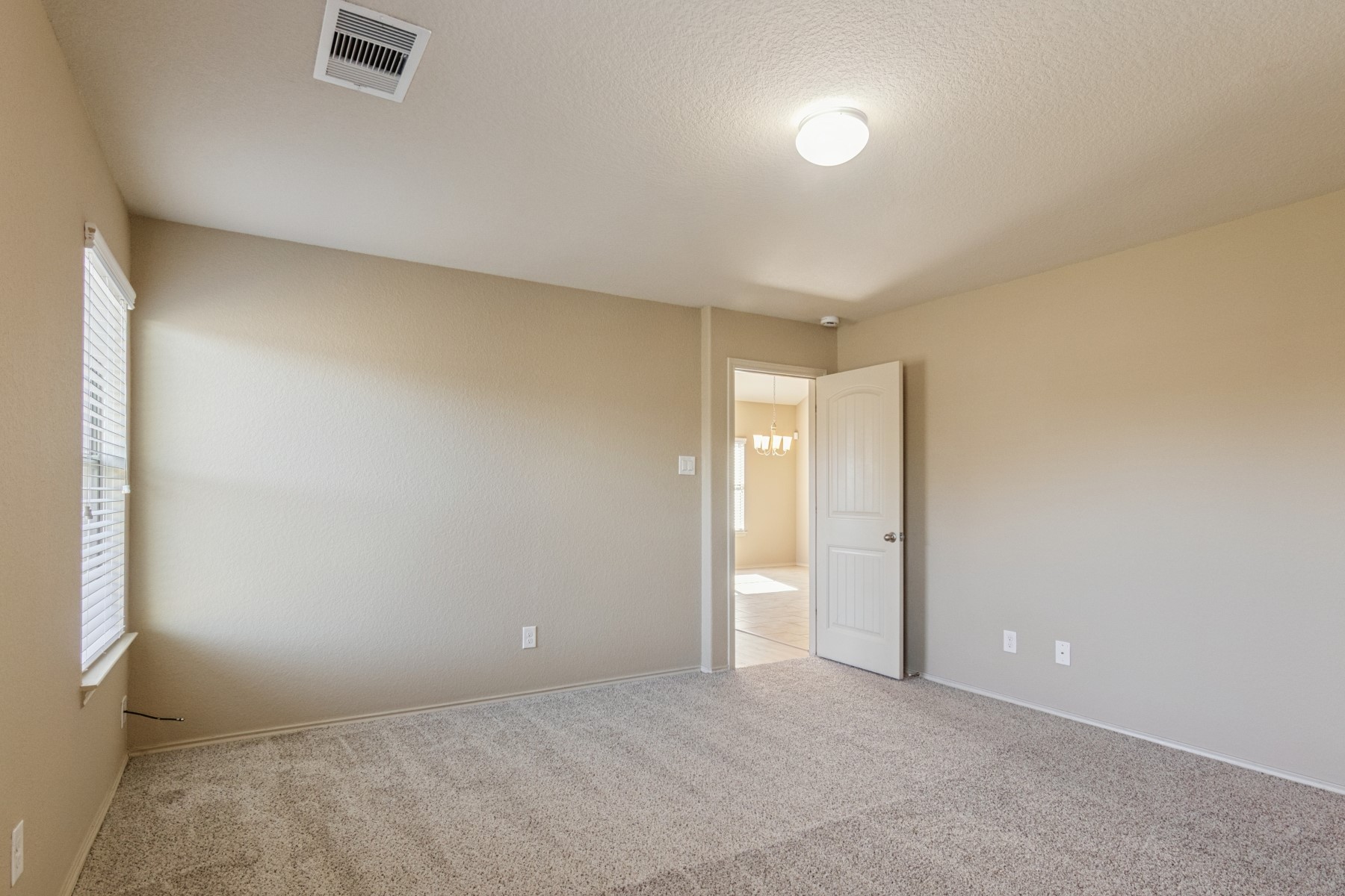 23330 Brat Pass Drive Spring, TX 77373 - Photo 16 of 28 an empty room with closet area and mirror