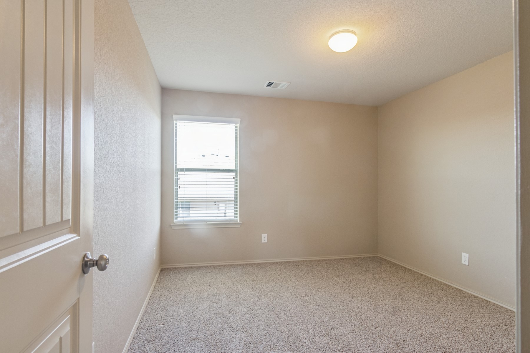 23330 Brat Pass Drive Spring, TX 77373 - Photo 22 of 28 an empty room with a window