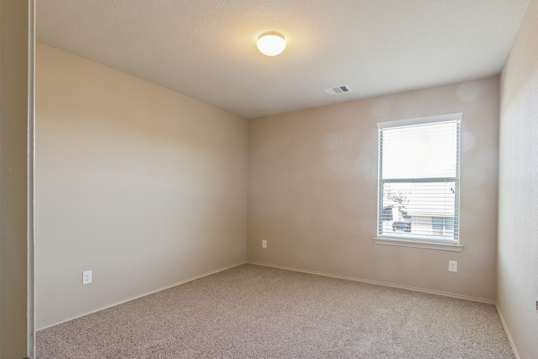 23330 Brat Pass Drive Spring, TX 77373 - Photo 23 of 28 an empty room with a window
