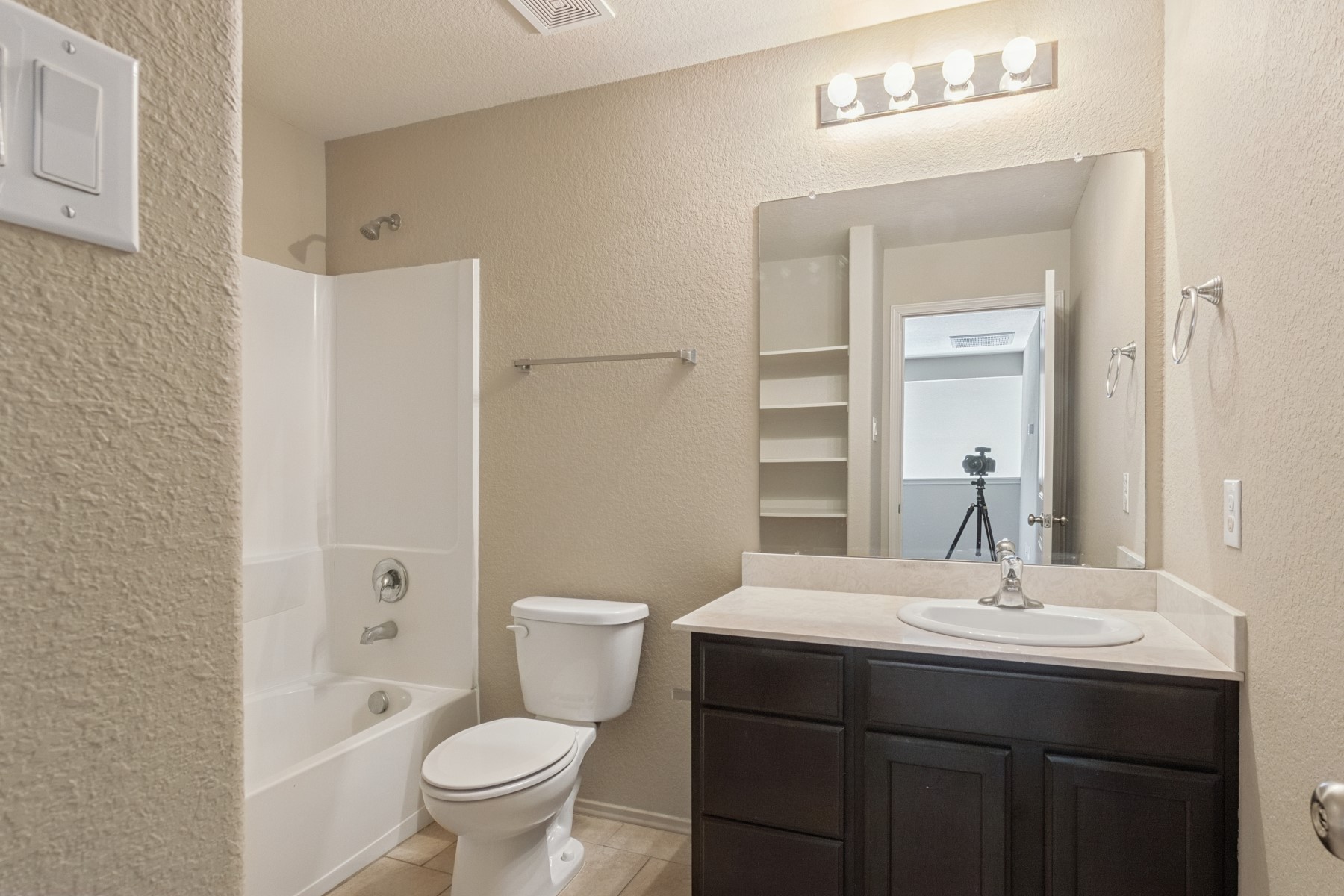23330 Brat Pass Drive Spring, TX 77373 - Photo 24 of 28 a bathroom with a sink a toilet and shower