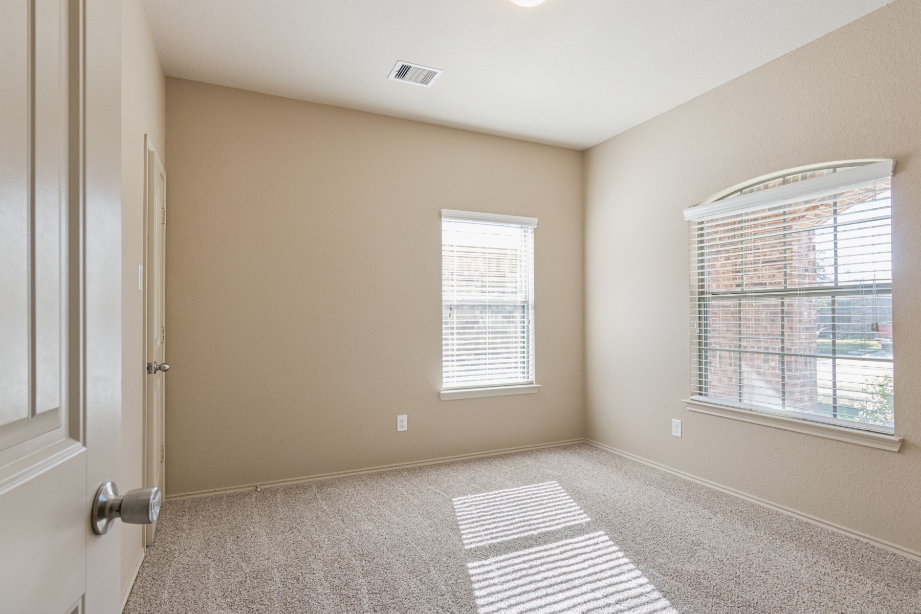 23330 Brat Pass Drive Spring, TX 77373 - Photo 9 of 28 a view of an empty room with a window