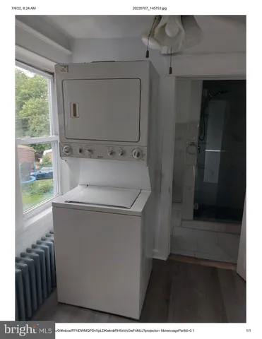a utility room with washer and dryer