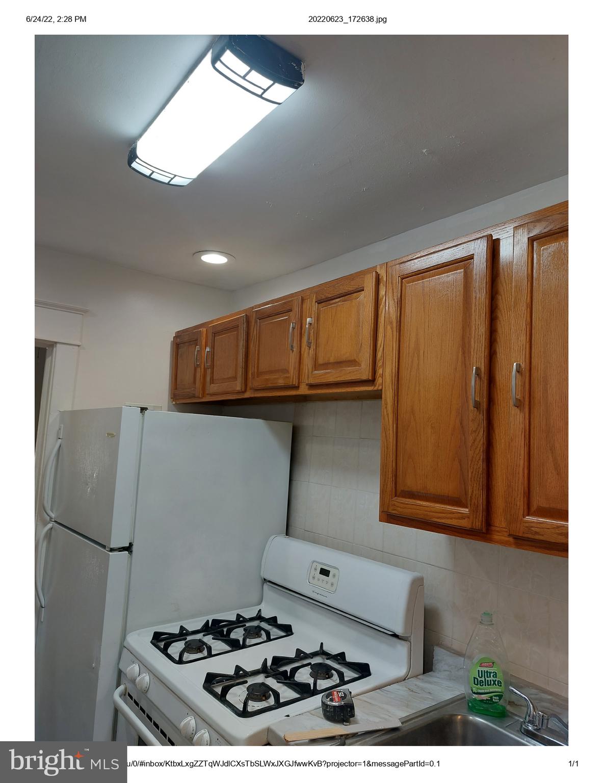 1 Madison Avenue, Unit B Mount Holly, NJ 08060 - Photo 5 of 15 a kitchen with stainless steel appliances granite countertop a refrigerator and a sink