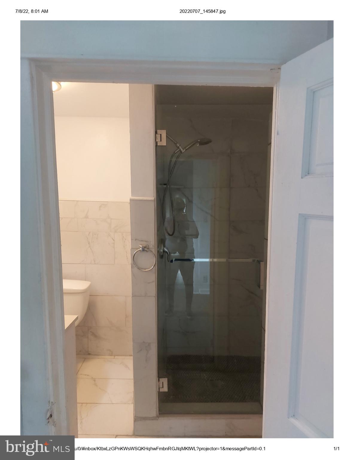 1 Madison Avenue, Unit B Mount Holly, NJ 08060 - Photo 8 of 15 a bathroom with a glass shower door