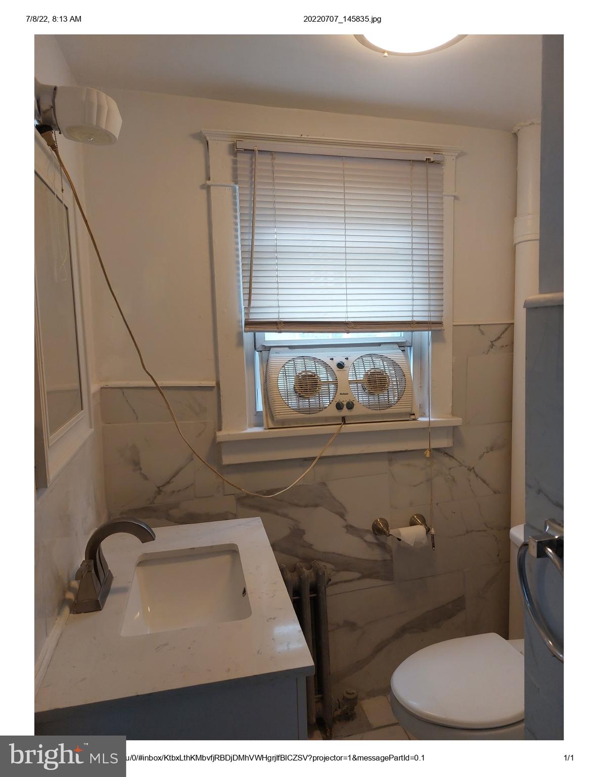 1 Madison Avenue, Unit B Mount Holly, NJ 08060 - Photo 9 of 15 a bathroom with a sink toilet and mirror