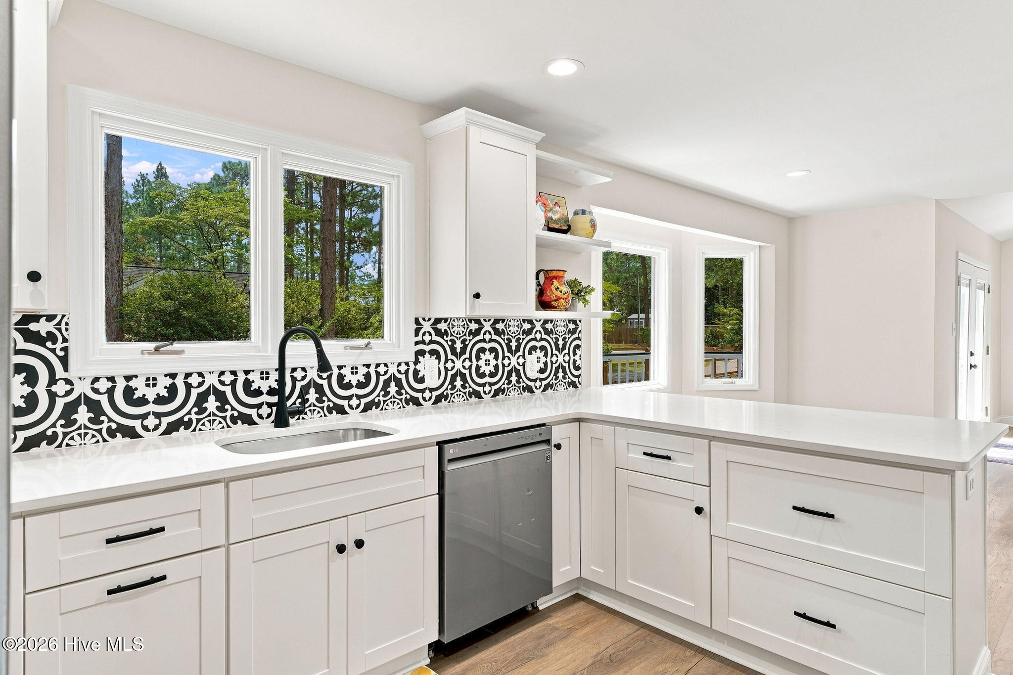 611 Sun Road Aberdeen, NC 28315 - Photo 6 of 59 Kitchen main house with peninsula. Deep pot drawers
