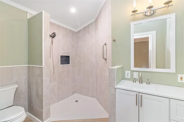 a view of a bedroom with windows