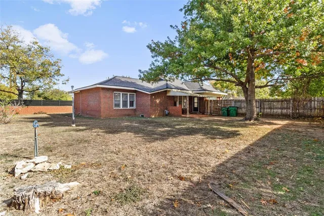 a view of backyard of house
