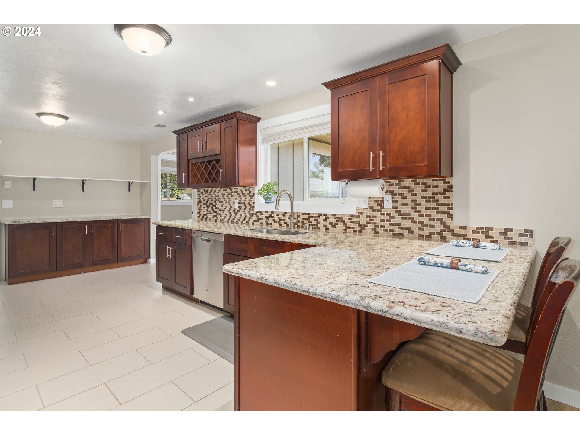 273 West Anchor Avenue Eugene, OR 97404 - Photo 12 of 43 a kitchen with a sink and cabinets
