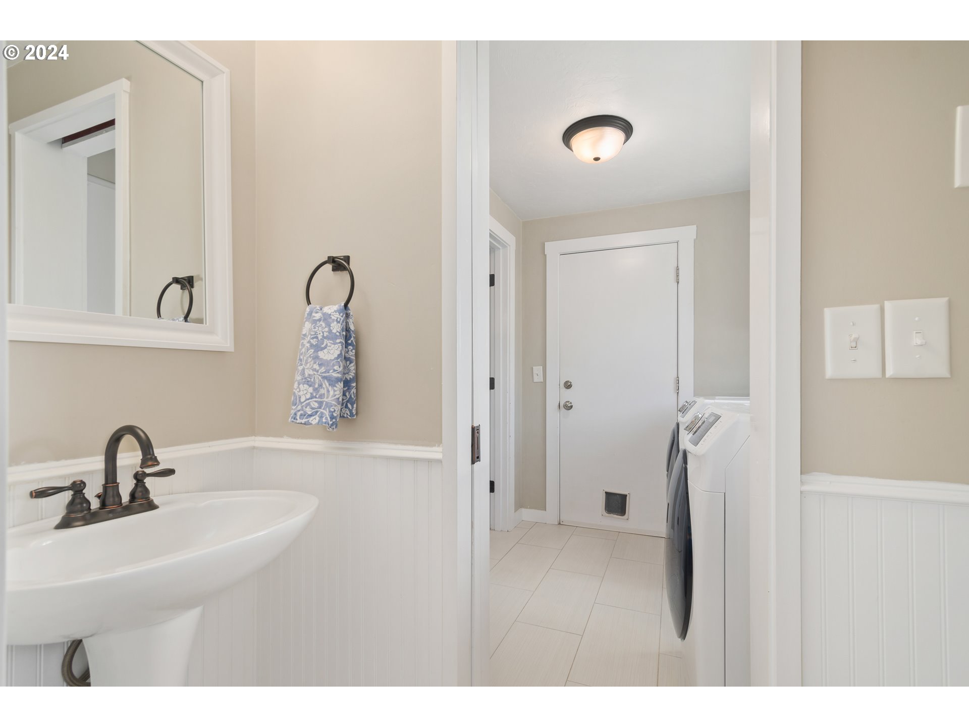 273 West Anchor Avenue Eugene, OR 97404 - Photo 19 of 43 a bathroom with a sink and a mirror