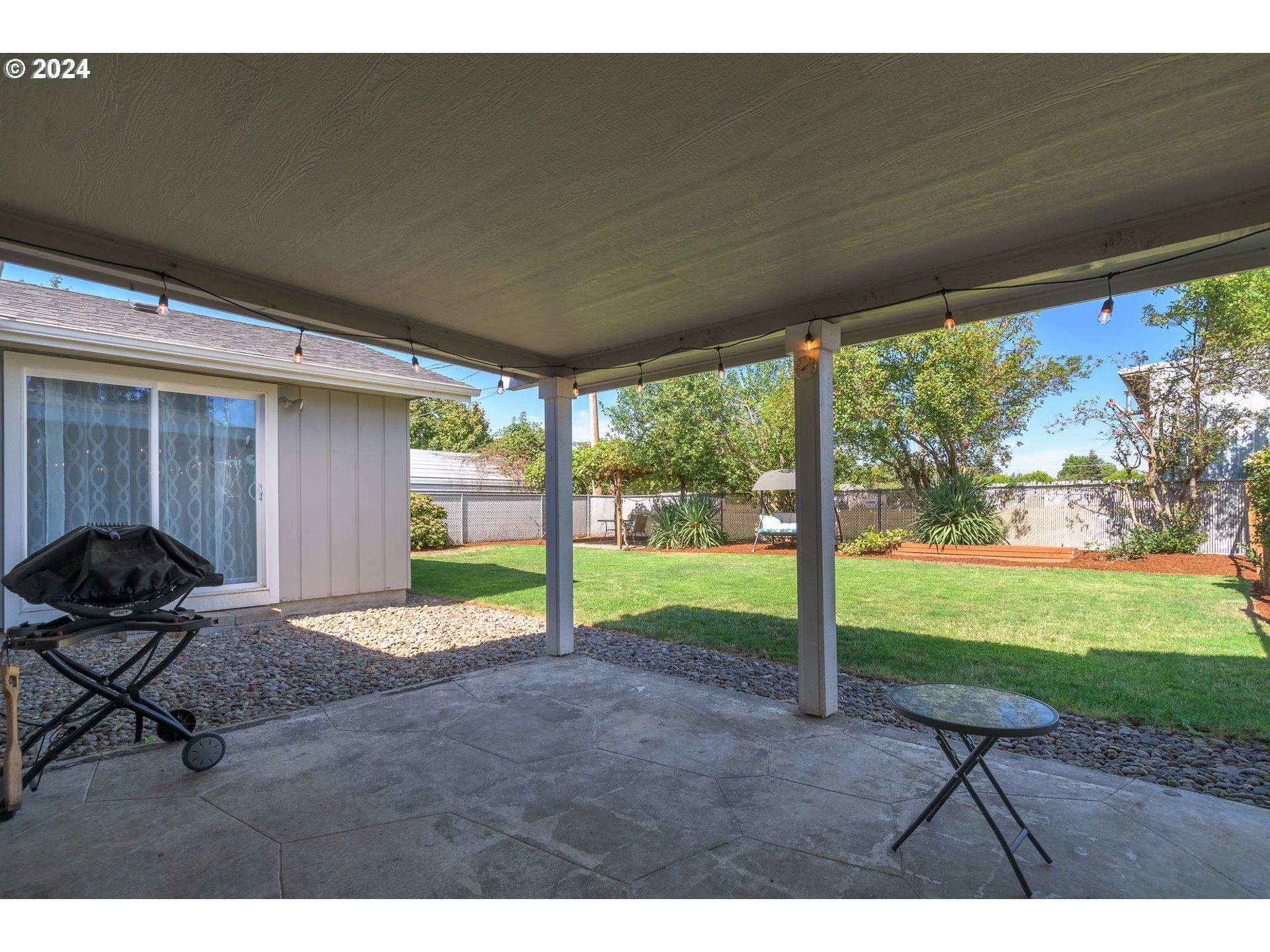 273 West Anchor Avenue Eugene, OR 97404 - Photo 33 of 43 a view of a backyard with furniture and garden