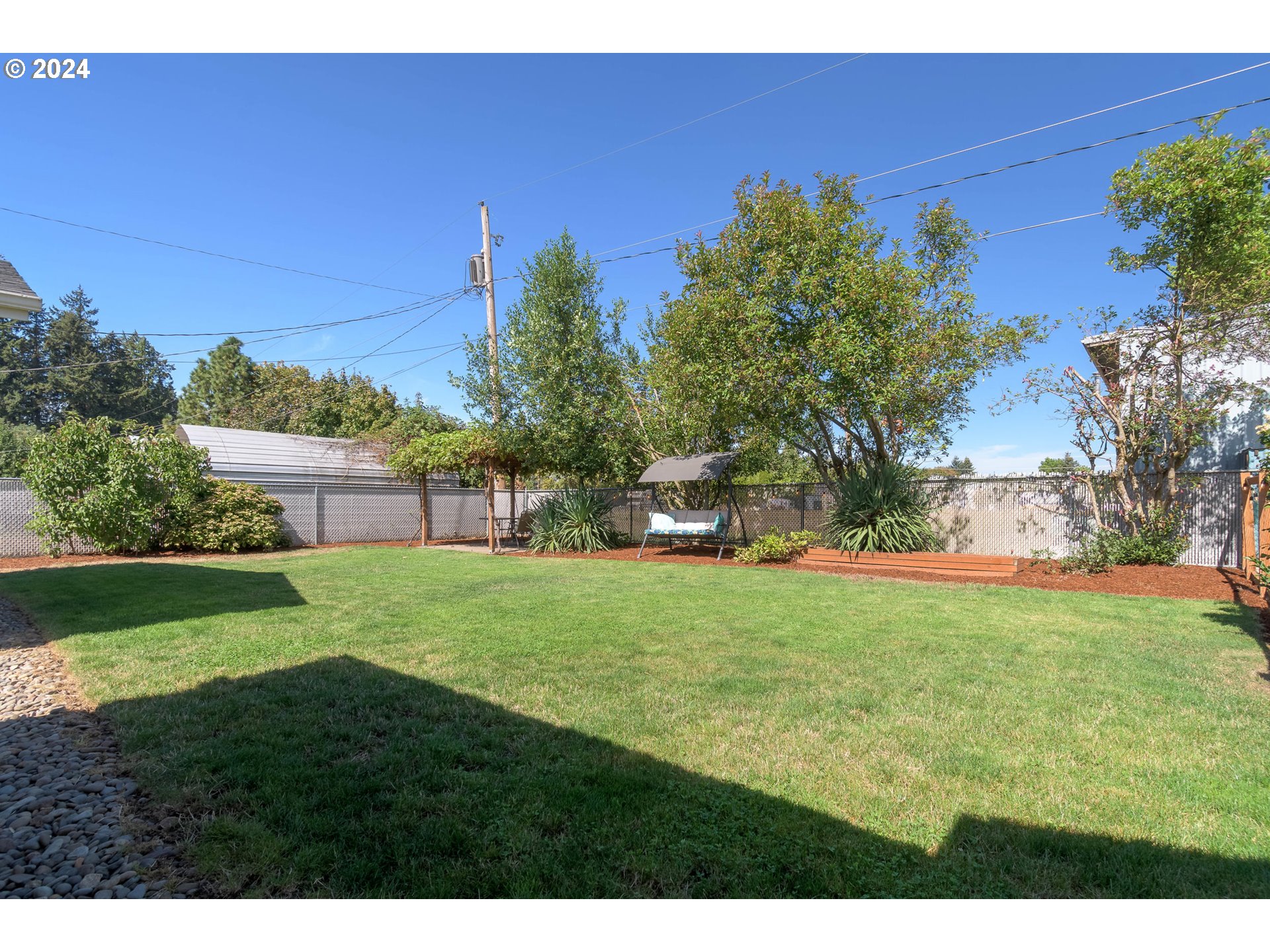 273 West Anchor Avenue Eugene, OR 97404 - Photo 34 of 43 a view of a park with a house in the background