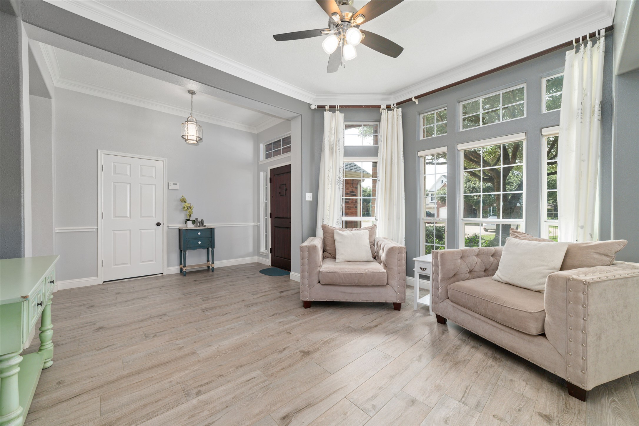 24203 Moon Ridge Court Katy, TX 77494 - Photo 8 of 43 The depth of this living space makes it perfect for formal, casual, or simple space to just relax and enjoy a good book!