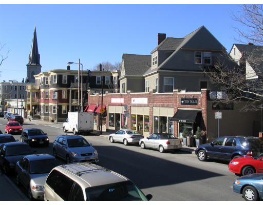 584 Centre Street Boston, MA 02130 - Photo 20 of 26 a city street filled with lots of traffic and tall buildings