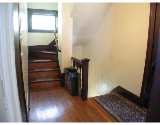 584 Centre Street Boston, MA 02130 - Photo 25 of 26 a view of entryway and hall with wooden floor