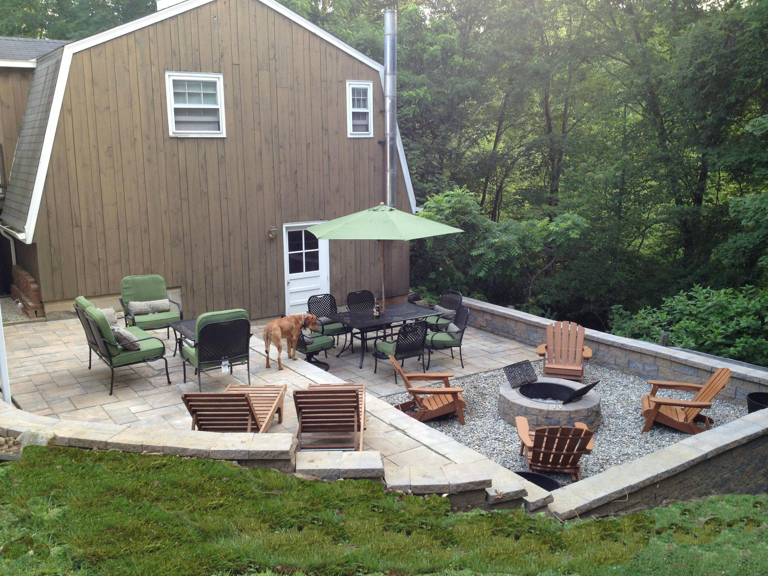 296 Belden Hill Road Wilton, CT 06897 - Photo 14 of 18 a view of a patio with chairs and a table
