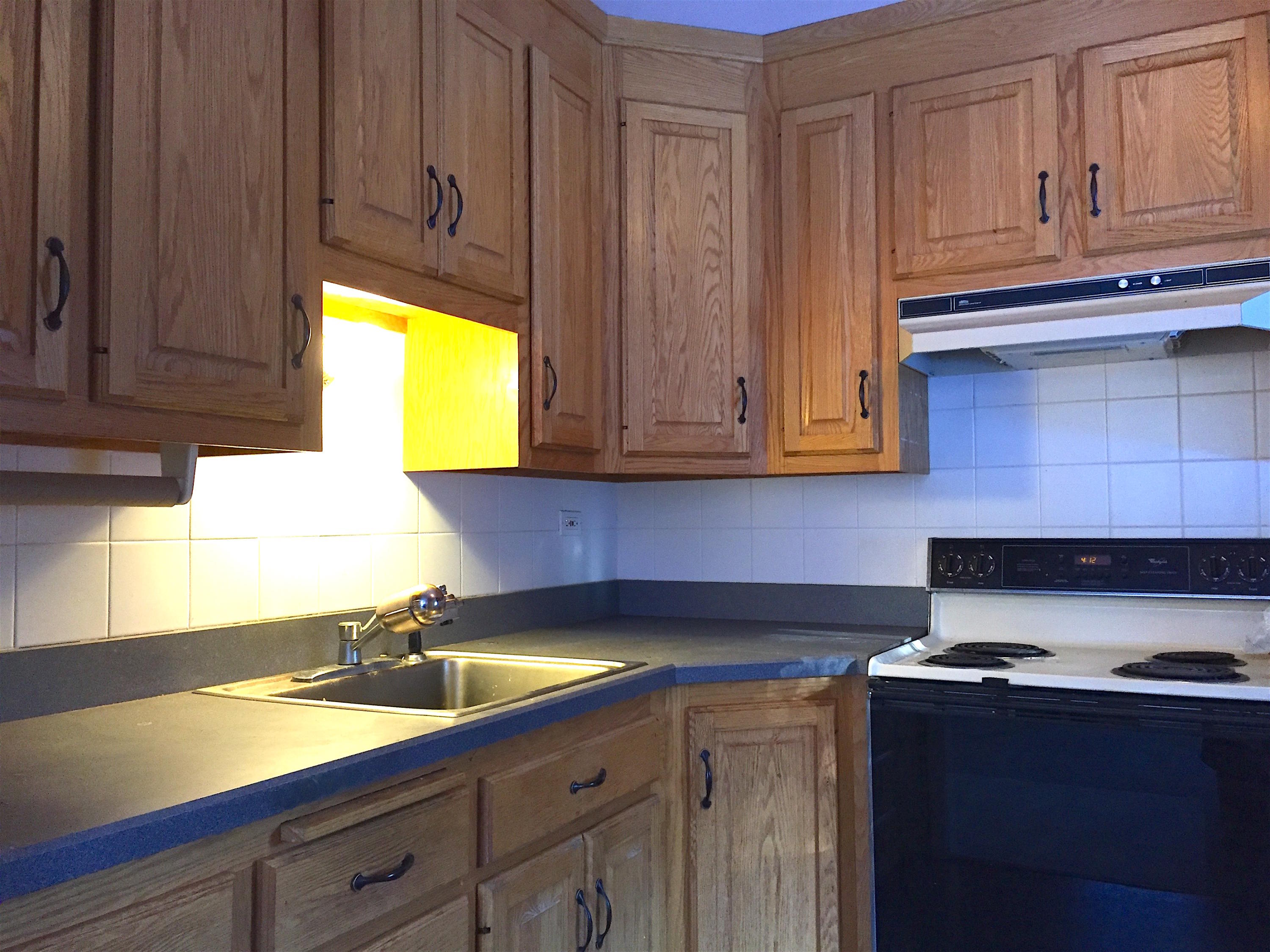 296 Belden Hill Road Wilton, CT 06897 - Photo 5 of 18 a kitchen with granite countertop cabinets and window