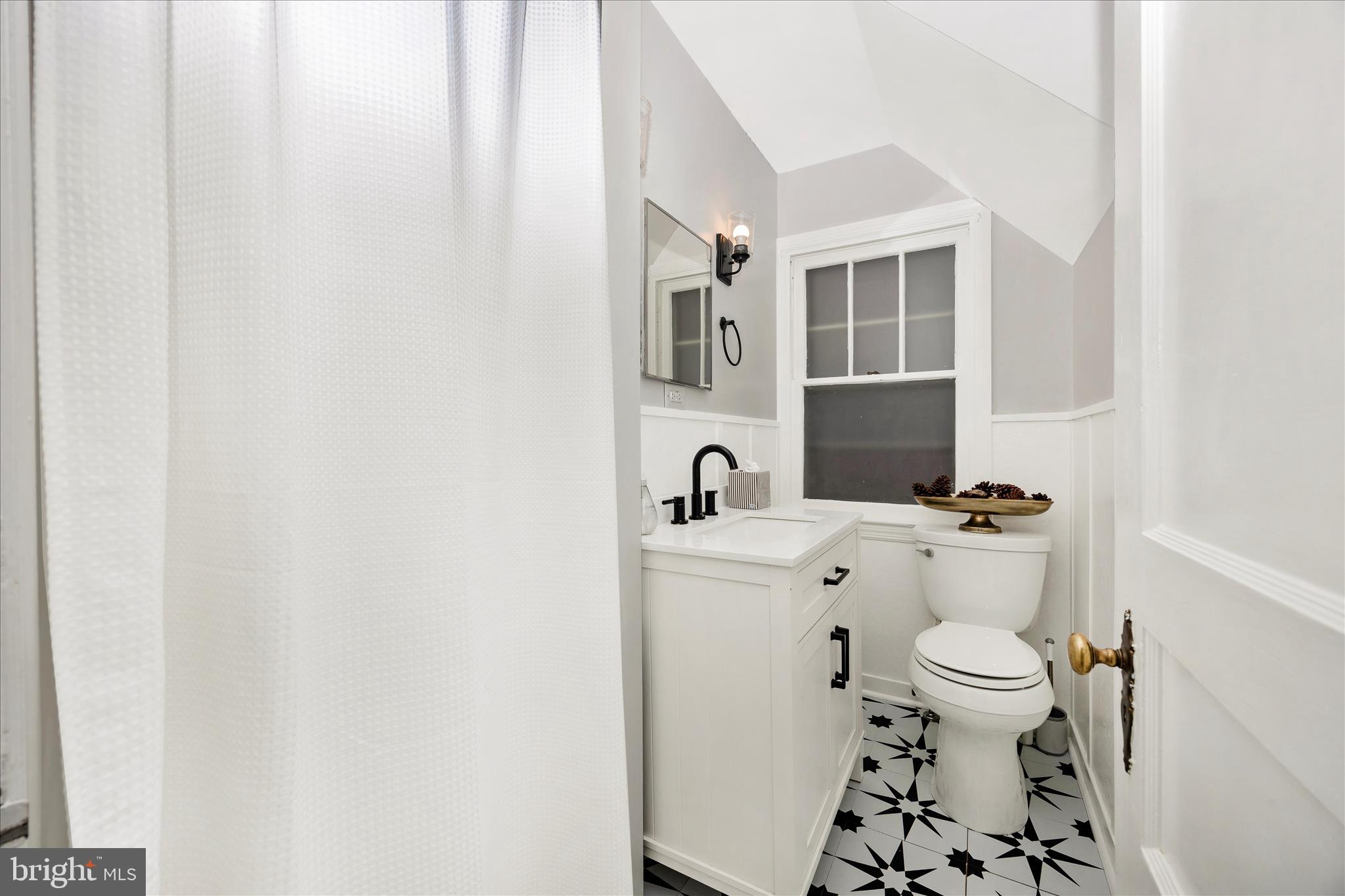 633 Lee Place Frederick, MD 21702 - Photo 14 of 48 a bathroom with a toilet and a sink