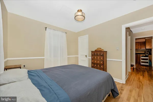a bedroom with a bed and a cabinets