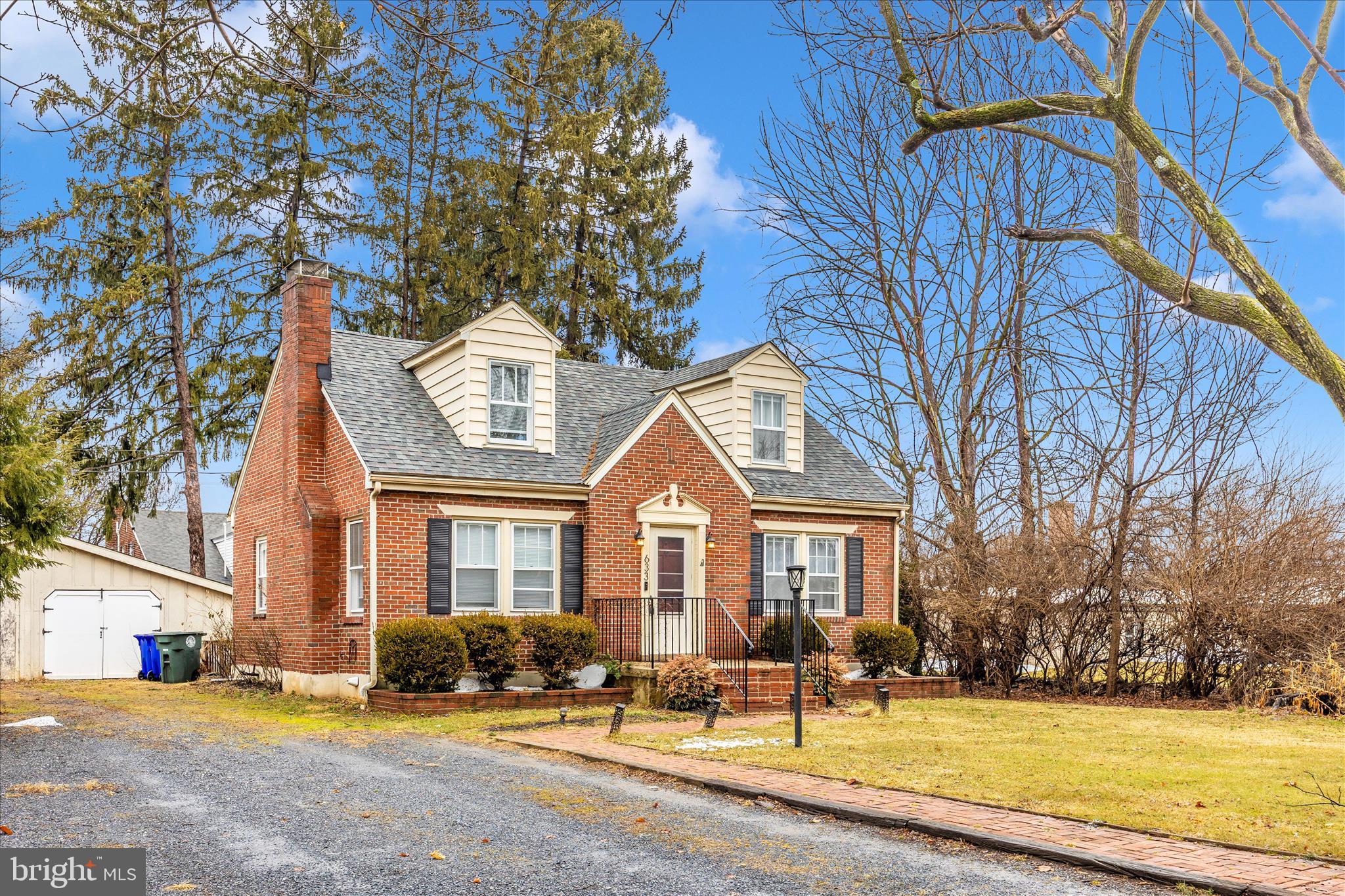 633 Lee Place Frederick, MD 21702 - Photo 2 of 48 a front view of a house with a yard
