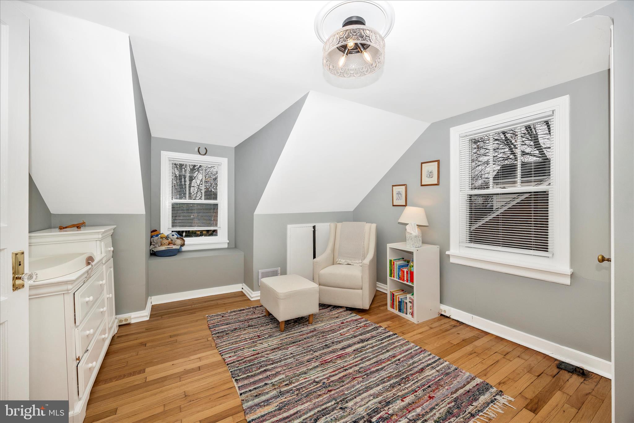633 Lee Place Frederick, MD 21702 - Photo 24 of 48 a living room with furniture and a wooden floor