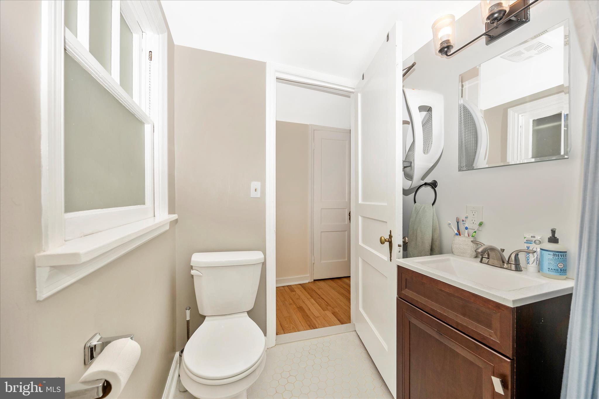 633 Lee Place Frederick, MD 21702 - Photo 29 of 48 a bathroom with a sink toilet vanity and shower