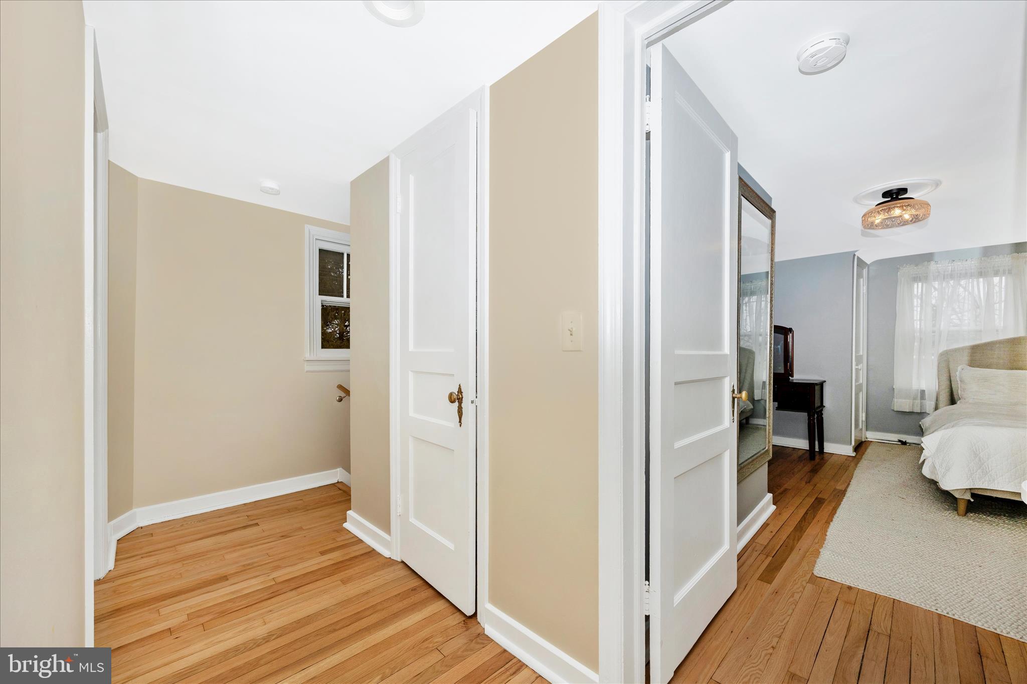 633 Lee Place Frederick, MD 21702 - Photo 30 of 48 a view of a bedroom with wooden floor and bedroom
