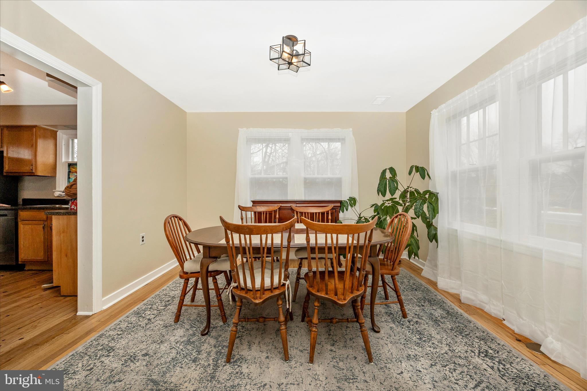 633 Lee Place Frederick, MD 21702 - Photo 7 of 48 a view of a dining room with furniture and window