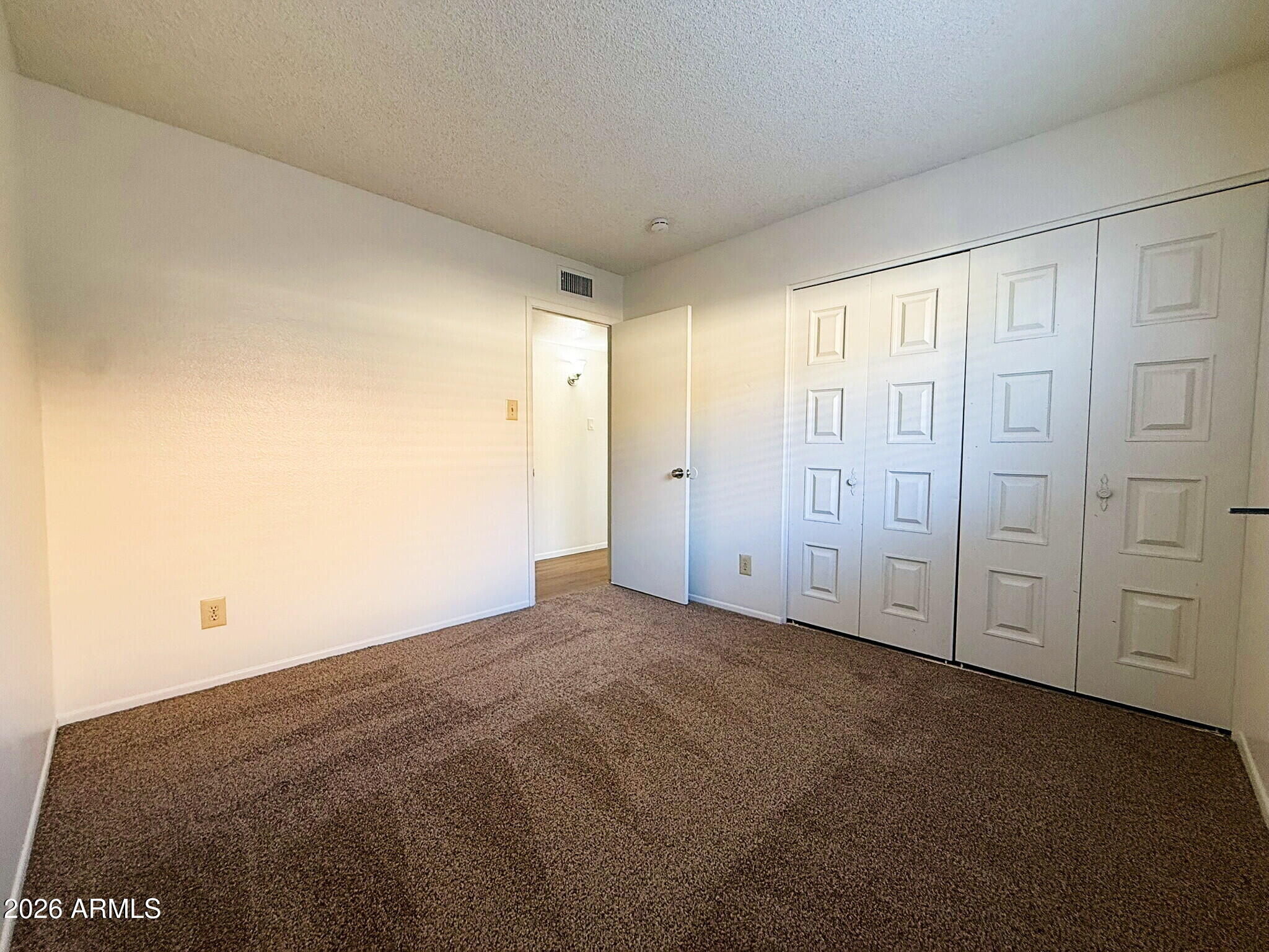 5208 West Calavar Road Glendale, AZ 85306 - Photo 18 of 39 a view of an empty room