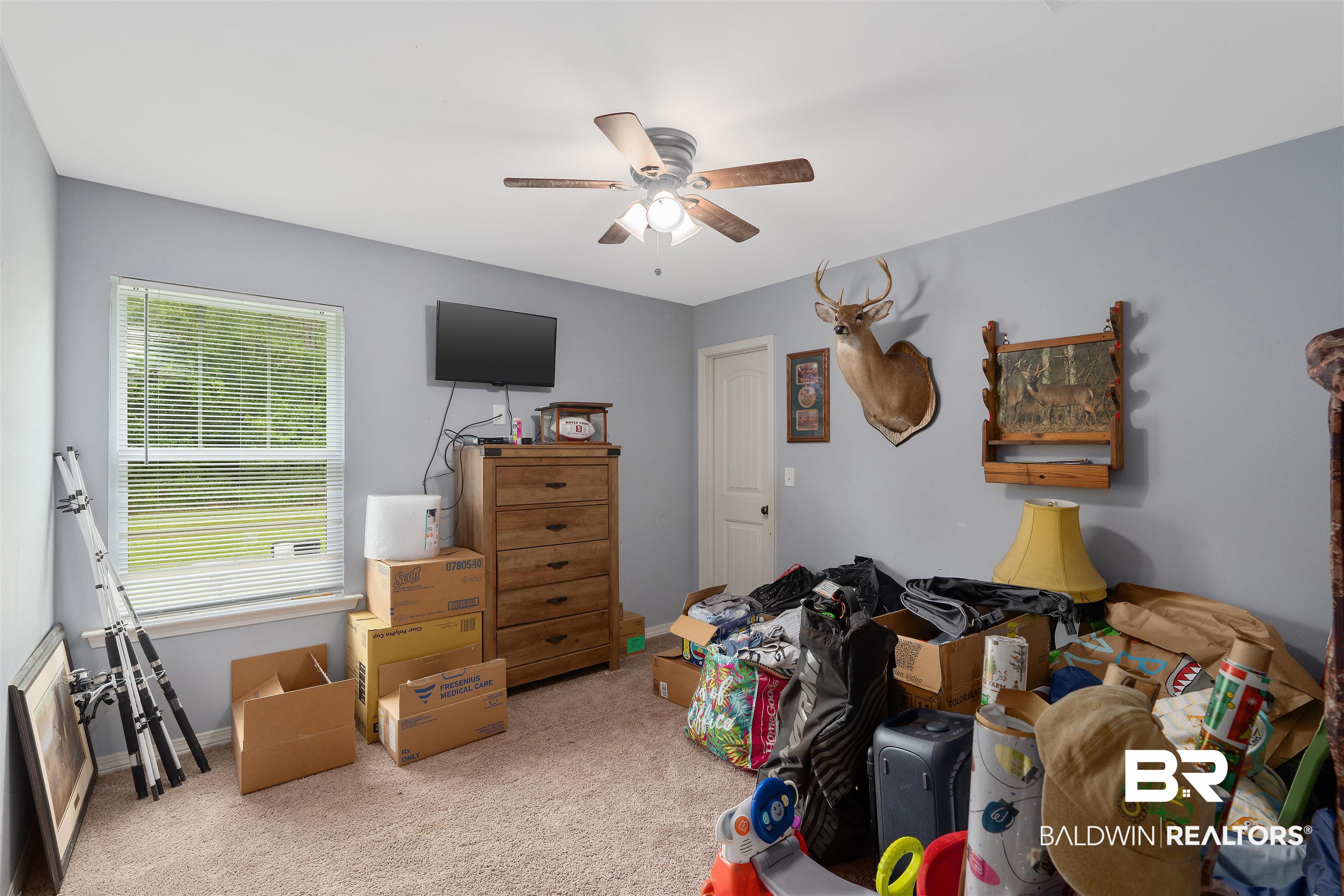 20076 Patty Jr Lane Bay Minette, AL 36507 - Photo 21 of 31 Bedroom featuring ceiling fan and light colored carpet