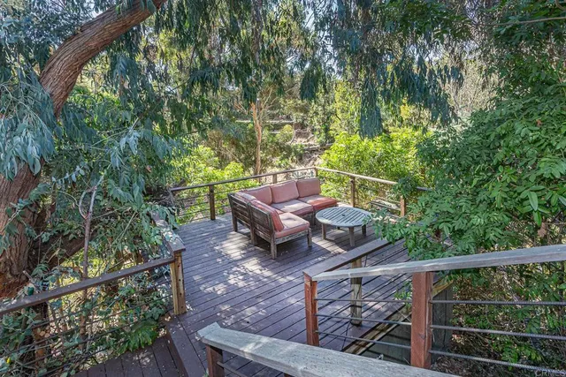 a view of a yard with furniture