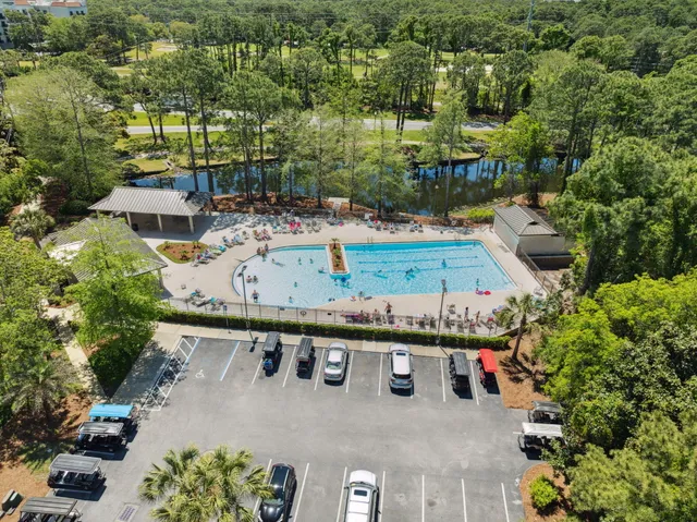 an aerial view of a house with outdoor space
