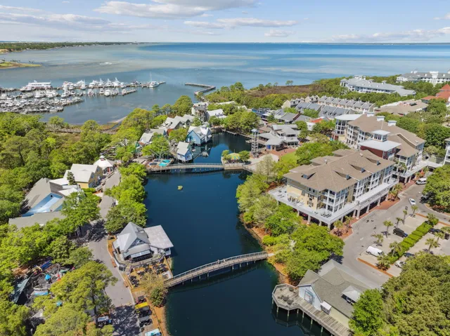 an aerial view of a house with a lake view