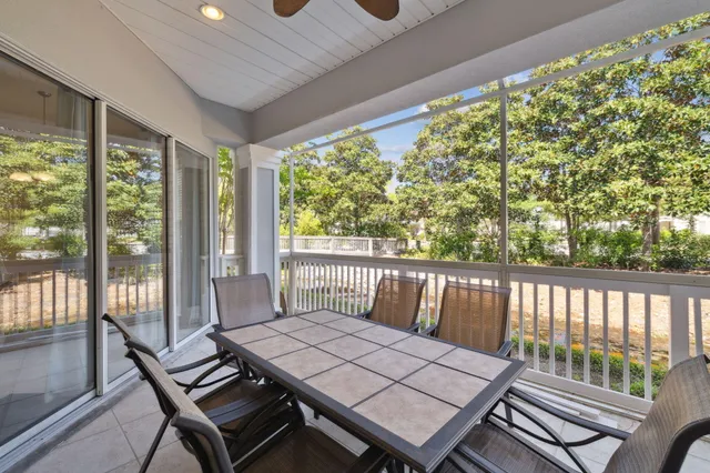 a view of a balcony with furniture