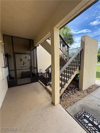 a view of a porch with wooden floor