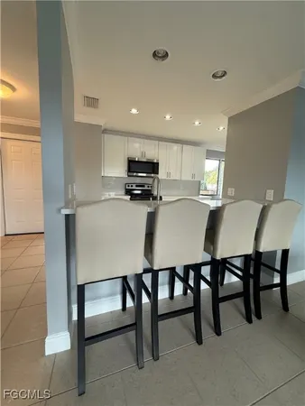 a chairs and a table in a room
