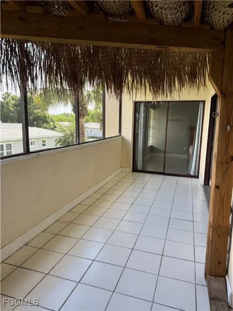 a view of a back yard from a balcony
