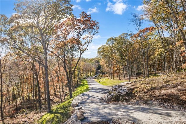 a view of a yard with swimming pool