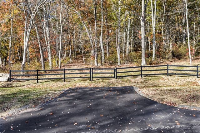 a view of backyard with green space